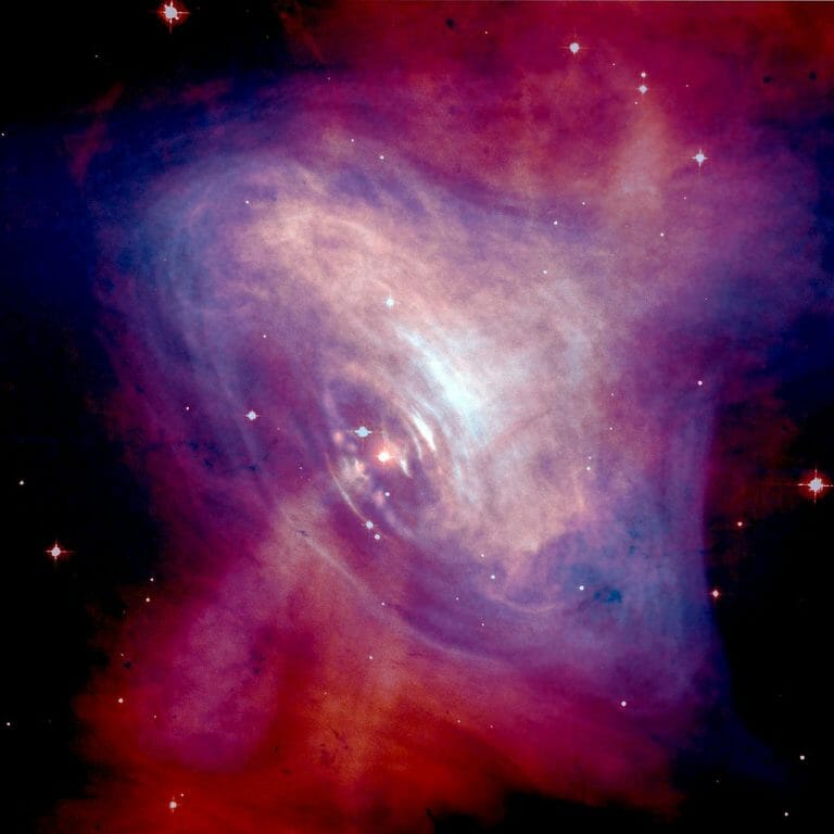 かに星雲の光学データ（赤色）とX線画像（青色）を合成した画像
